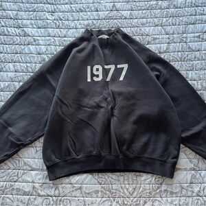 Essentials Black Crewneck Sweater with 1977 Design